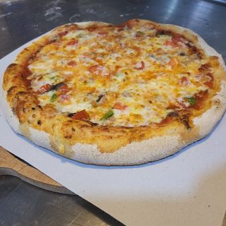 Pizza de la casa 33cm