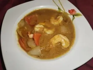 Gamberoni con aglio tikka balti