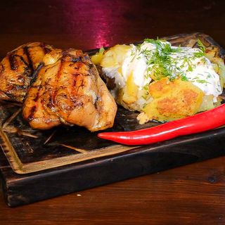 Куряче стегно у фірмовому маринаді (300/150 гр)