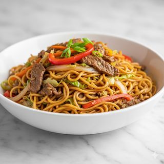 Tallarines De Huevo Salteado Con Ternera