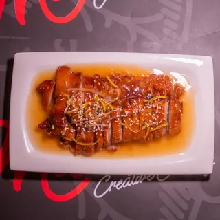 Pato Caramelizado Con Semillas De Sésamo