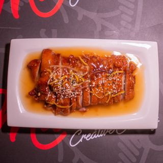 Pato Caramelizado Con Semillas De Sésamo