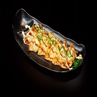 G4-Spicy Okonomi Gyoza (6und)
