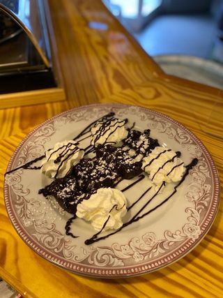 Coulan de chocolate templado nata y azúcar glasé