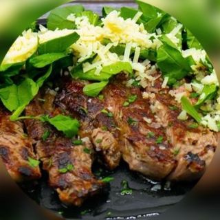 Tagliata di carne rucola e scaglie di grana