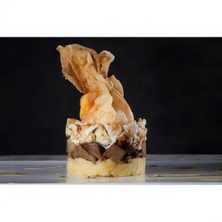 Timbal de Huevos Rotos