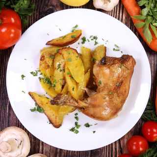 Пилешко бутче на каменна пещ с печени картофи (350г)