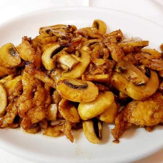 Cerdo Con Champiñones