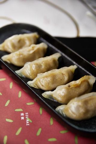 Raviolis de pato y foie a la plancha