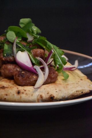 Ćevapčići from grill (bun-lepinja and ajvar)