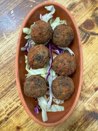 Arancinetti al nero di seppia