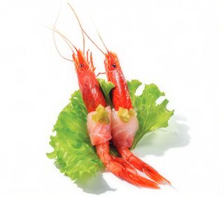 203. Sashimi de Langostinos Rojos Envuelto de Lubina (3 Pzs.)