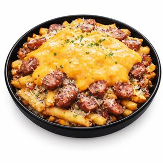 Картопля фрі з беконом, пармезаном та сиром чедер