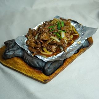 Казан кебаб на жаровне