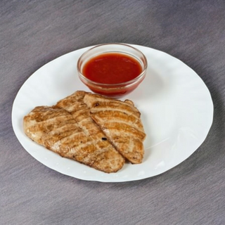 Pileći file na porciju