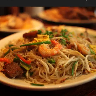 35 Fideos de arroz frito Singapur