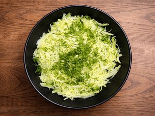 Салат з молодої капусти (200g)