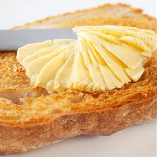 1/2 tostada de mantequilla 