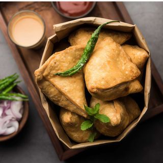 Reacción Samosa de pollo