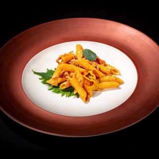 Penne con panna speck e pomodoro