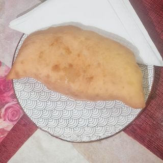 Panzerotto con mortadella e pistacchio fritto