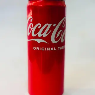 153. Coca-Cola Lattina 330 ml