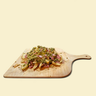 Mortadella, salsa al pesto e granelle di pistacchio
