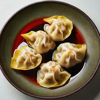 003c Ravioli di pollo