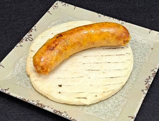 Chorizo santarrosano con arepa (1 ud.)