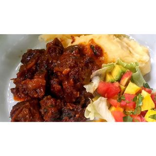 Pan Fried Goat's Meat With Matooke