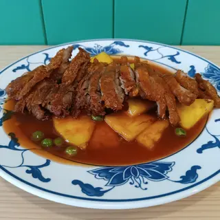 Pato com ananás