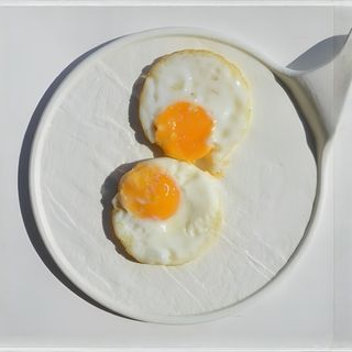 Яйцо жареное