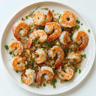 286. Gamberoni  saltati  con scalogno - 5 pezzi 