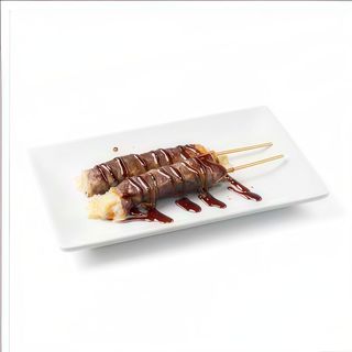 60 - Pincho de ternera con queso