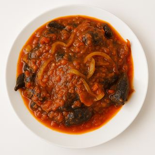 Escargots Sautés + Attiéké 