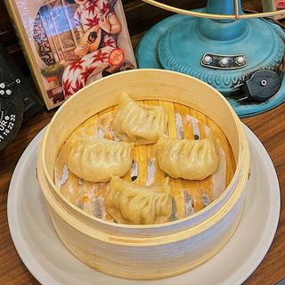 208 Ravioli con ripieno carne e verdure al vapore 菜肉蒸饺