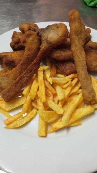 Costillas de cabrito milanesa