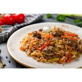 Pilau Served with Chapati ,Goats Meat and a  330ml PET Soda