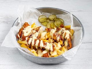 Хрумка курка з картоплею під сирним соусом (390g)