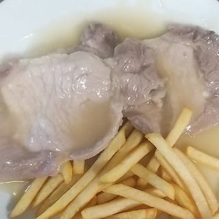 Escalopines cerdo al vino blanco