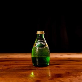 Agua con gas (330 ml.)