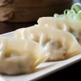 Gyoza de vegetais cozidos no vapor com molho teriyaki (4 peças)
