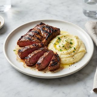 Entraña Con Parmentier De Patatas