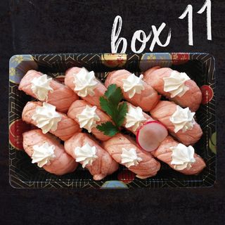 box 11.nighi salmone flambe