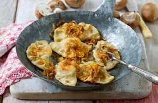 Pierogi z kiszoną kapustą i pieczarkami