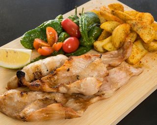 Secreto ibérico con patatas y pisto manchego