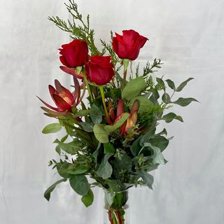 3 rosas rojas