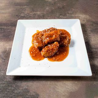 Costine di maiale caramellato all'aglio