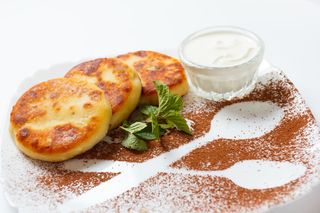 Сирники зі сметаною (120/50г)