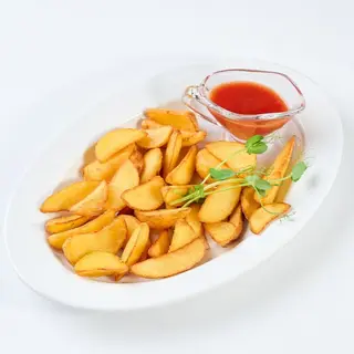 Картопля фрі по-селянськи (160/40г)